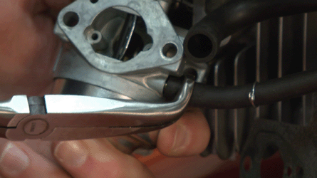 How to Replace the Carburetor on a Troy-Bilt TB130 Lawn Mower