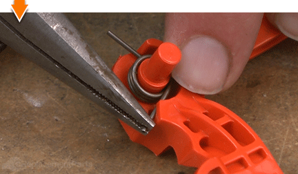 Align the spring in the housing